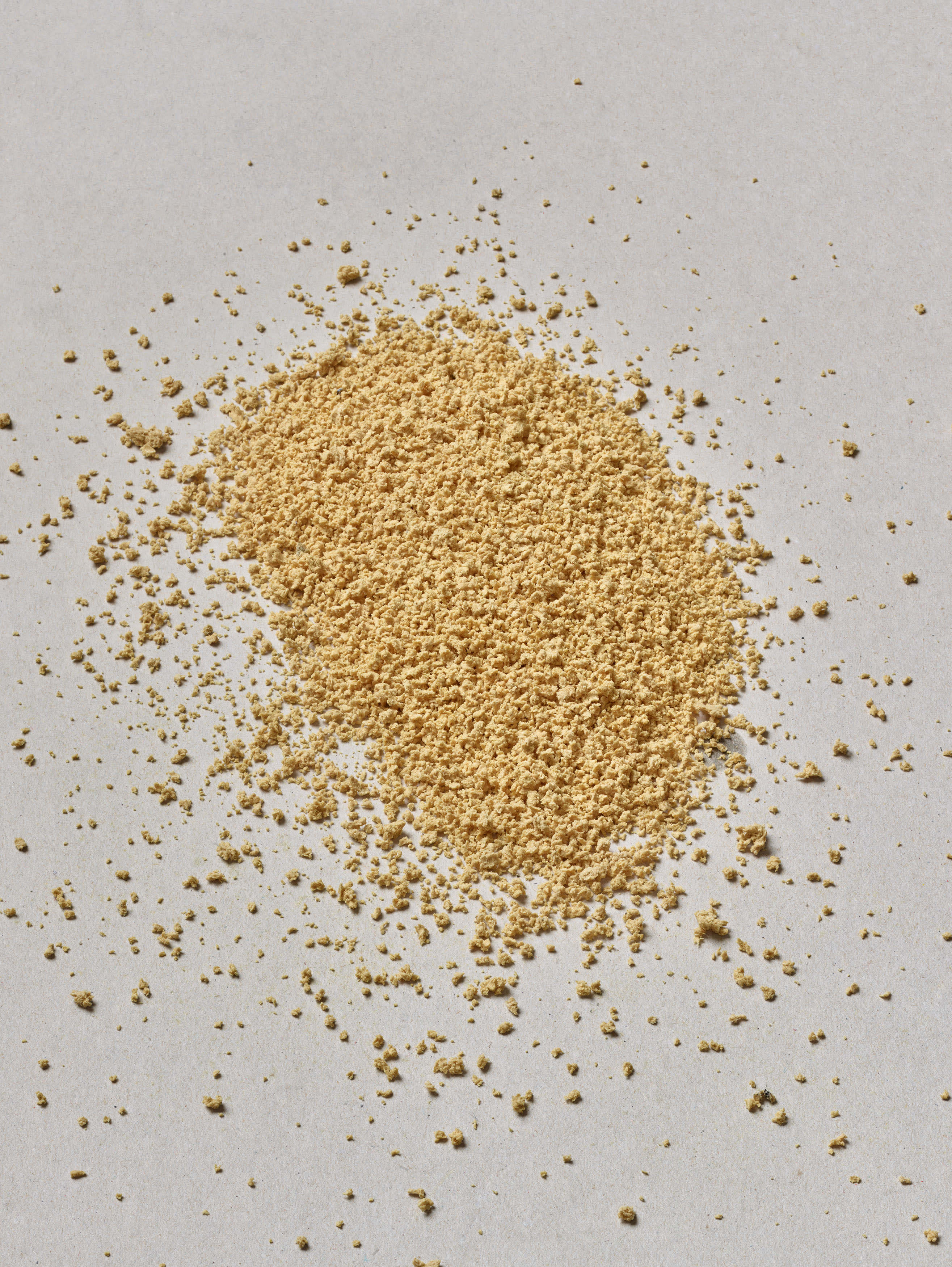 Combining all the ingredients and chipping them into a granulate which we then press to shape